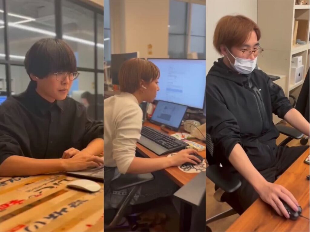 成員們正在 Vibe Coding 中的照片。
